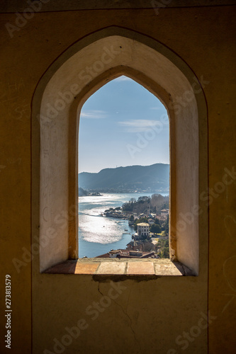 View of Cernobbio from the window of an abandoned fortress tower. Lake Como, Northern Italy.