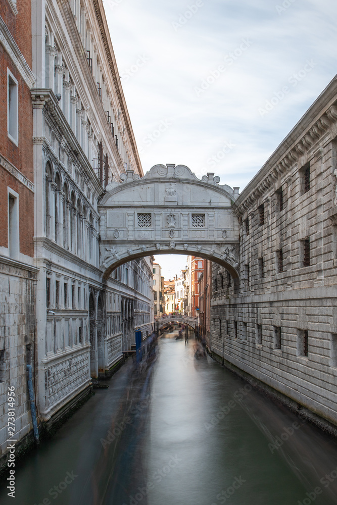 View of the Bridge of Sighs (Ponte dei Sospiri) and the Rio de Palazzo or de Canonica Canal in Venice, Italy. The Ponte de la Canonica is visible in background
