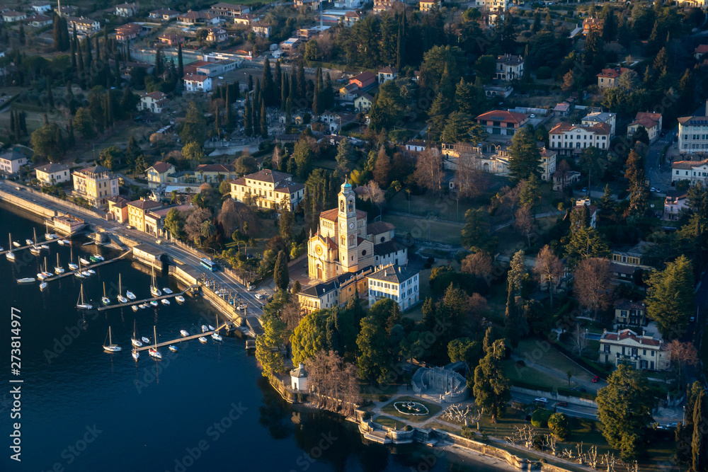 Church of San Lorenzo, flying over Lake Como. Tremezzo, Italy.