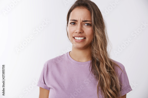 Canvas-taulu Portrait attractive dissatisfied grimacing woman hearing disgusting story frowni