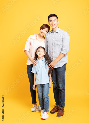portrait of happy family standing together isolated