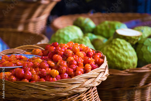 Fresh pitanga and anonna fruits photo