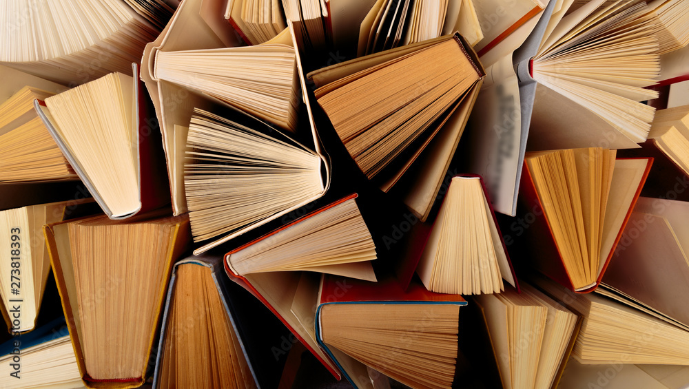 Fototapeta premium Old and used hardback books top view .