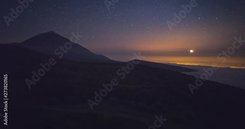 Timelapse of the Moon setting in Teide national park, Tenerife, Canary Islands, Spain.  Astrofotography and dark skies in Tenerife. photo