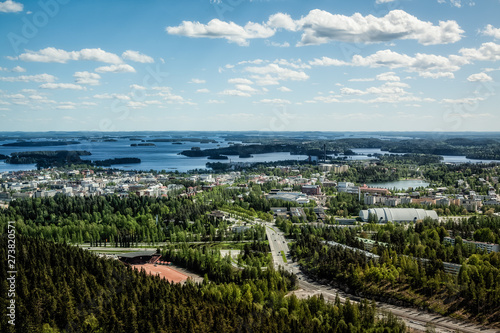 The view from the heights of the city of Koupio in Finland and lakes in summer in Sunny weather