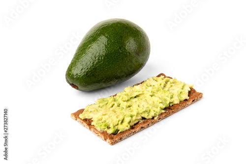 Bread with avocado isolated on white background.
