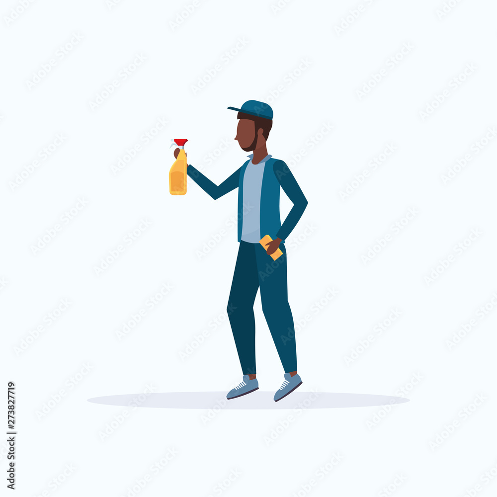 male janitor in uniform holding washcloth and spray plastic bottle african american man cleaner spraying cleaning service concept full length flat white background