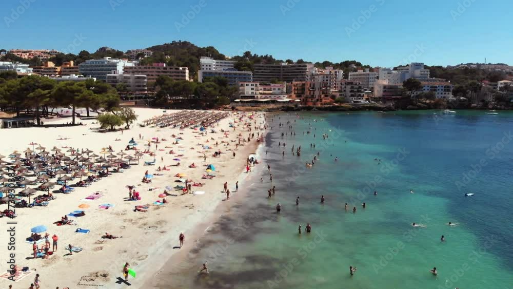 People enjoying the sun, at Mallorca Sant Ponsa Beach. 4K Video. People enjoying the sun, at Mallorca Sant Ponsa Beach. 4K Video.