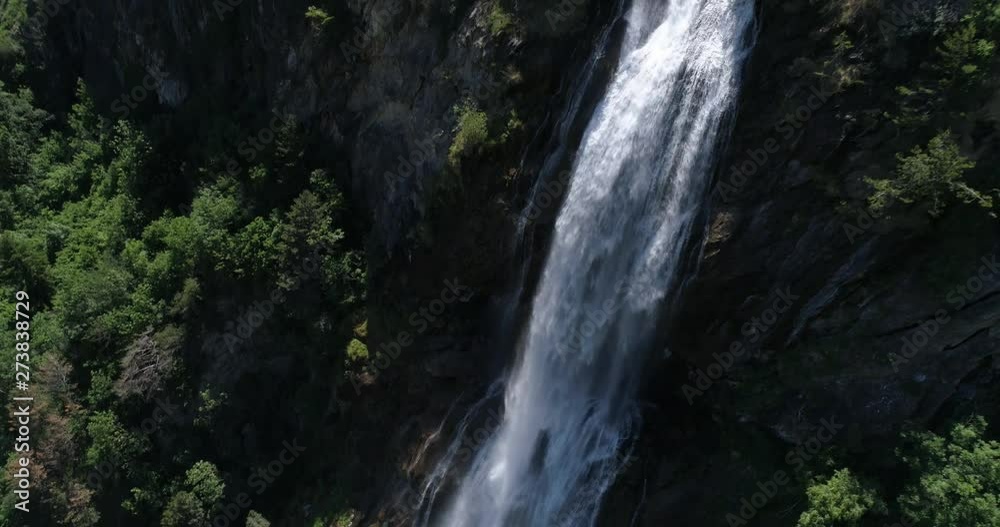 Descending view on Pissevache cascade, near Martigny, Switzerland - Aerial 4K Descending view on Pissevache cascade, near Martigny, Switzerland - Aerial 4K