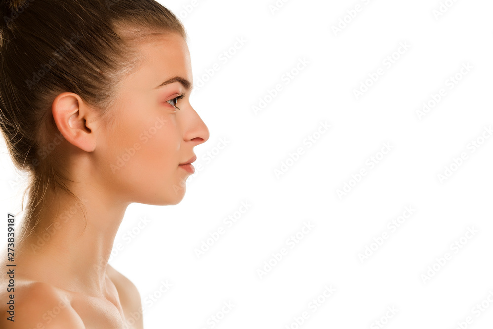 Profile of young beautiful shirtles woman on white background Profile of young beautiful shirtles woman on white background