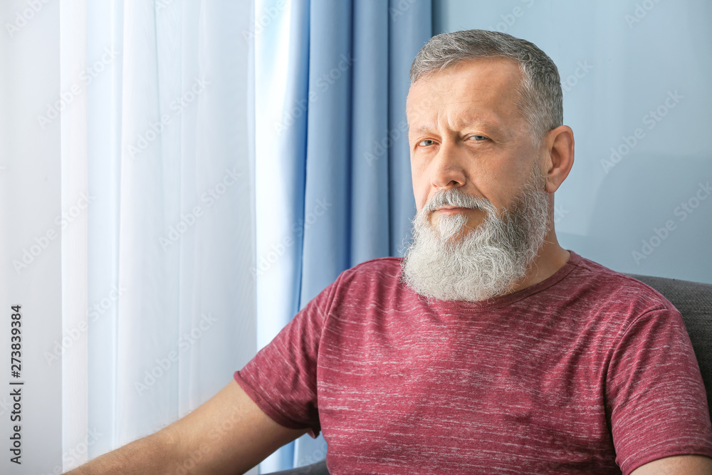 Portrait of mature man at home Portrait of mature man at home