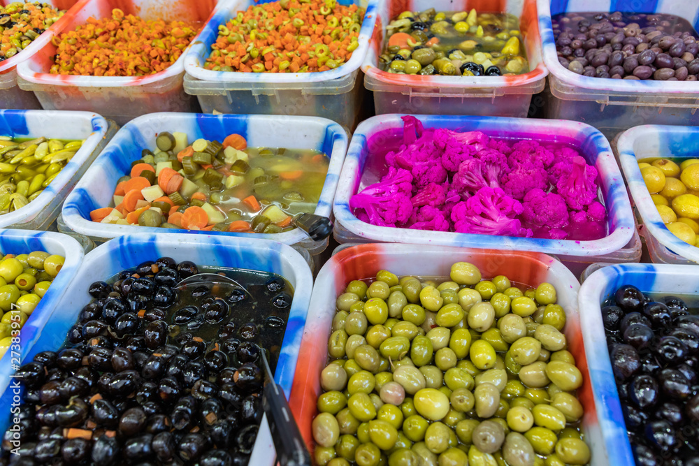 Pickles and olives at local market in Amman, Jordan. Middle East.