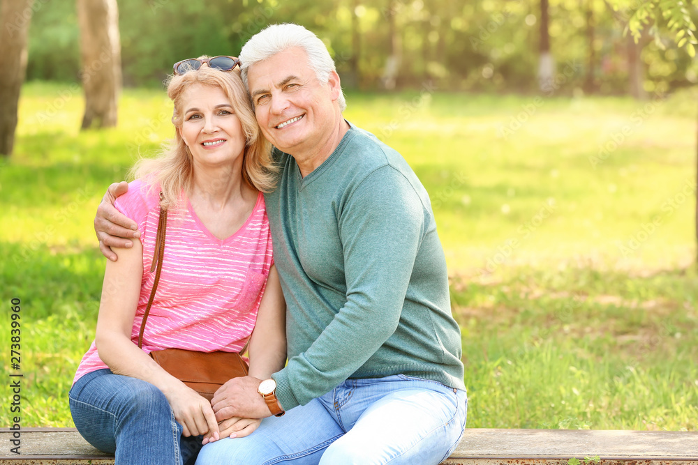 Portrait of happy mature couple in park Portrait of happy mature couple in park