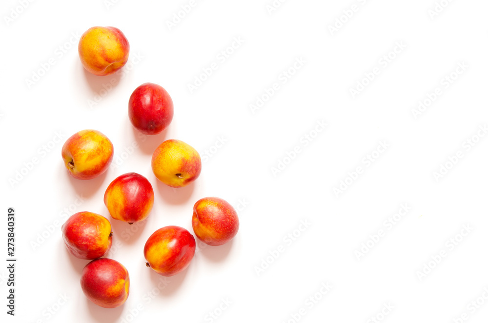 Ripe nectarines isolated on white background with copy space for your text. Top view. - Image