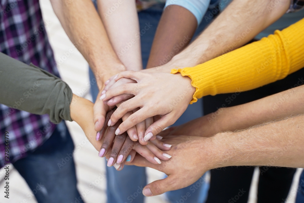 Young people putting their hands together. Friends with stack of hands showing unity and teamwork – Image Young people putting their hands together. Friends with stack of hands showing unity and teamwork – Image