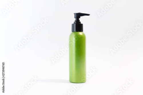 Blank plastic hand cream bottle on white background. Copy space