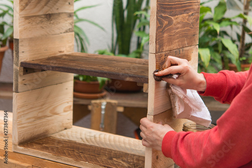 woman restoring furniture Real action