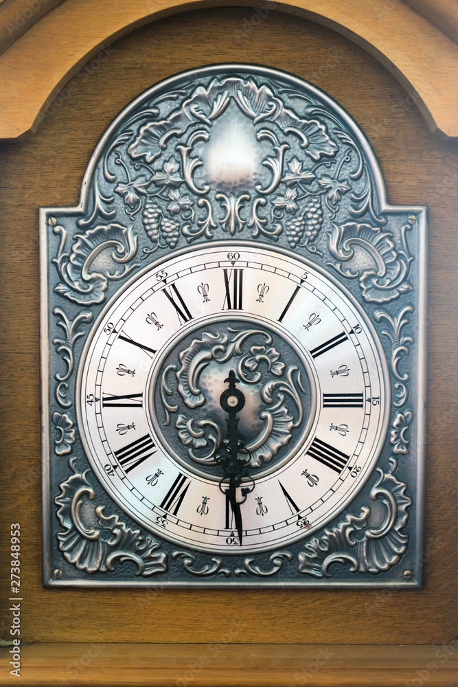 The dial of the old vintage wall clock, retro toned