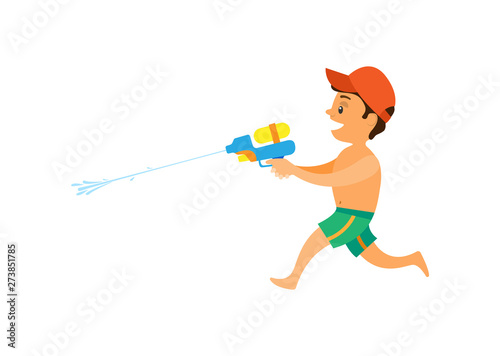 Canvas Print Boy shooting squirt gun, side view of running kid wearing shorts and cap, child
