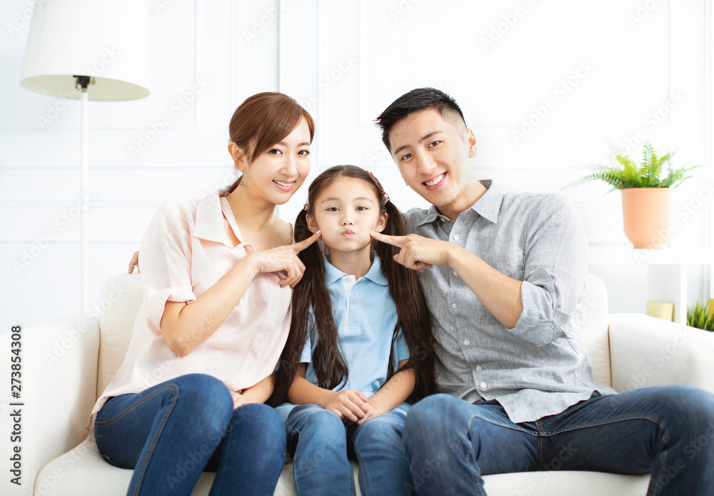 Happy parents and child having fun together Happy parents and child having fun together