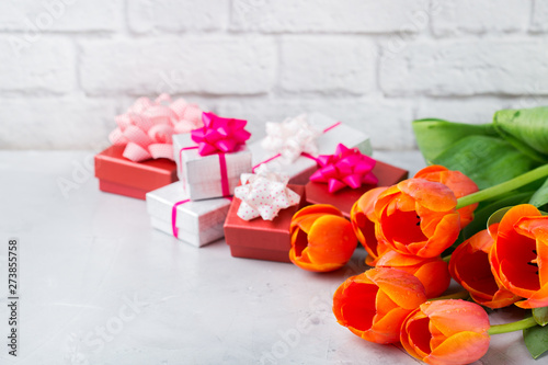 Spring background with orange tulips. women, mother day, greeting card