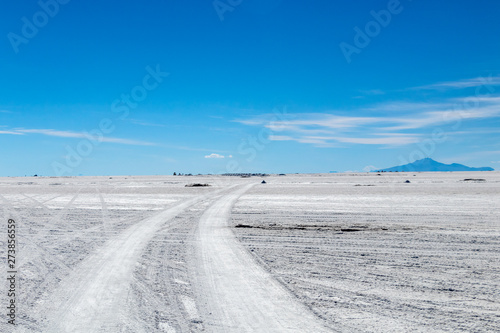Landscape of incredibly white salt flat Salar de Uyuni  amid the Andes in southwest Bolivia  South America