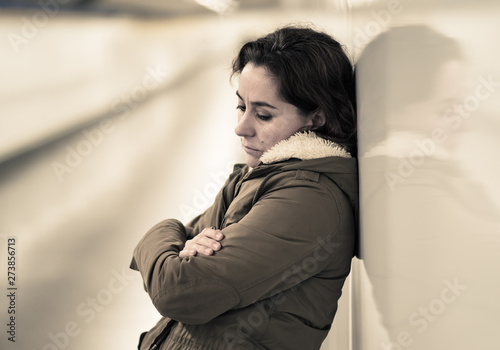Unhappy young woman feeling sad and stressed suffering from depr