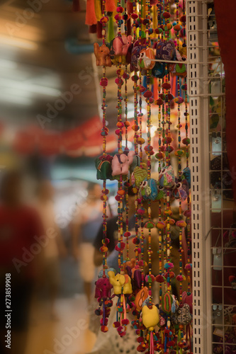 Elephant doll handmade string pendulum and the yarn of various colors. Be hung for decoration. Placed inside the Chatuchak weekend market. Bangkok, Thailand. © Araya
