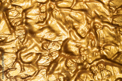 Golden grunge texture. Vintage abstract golden background for your design. Luxury golden background. Shiny golden texture.