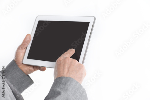 close up.businessman pointing finger at the blank screen tablet.isolated on white background
