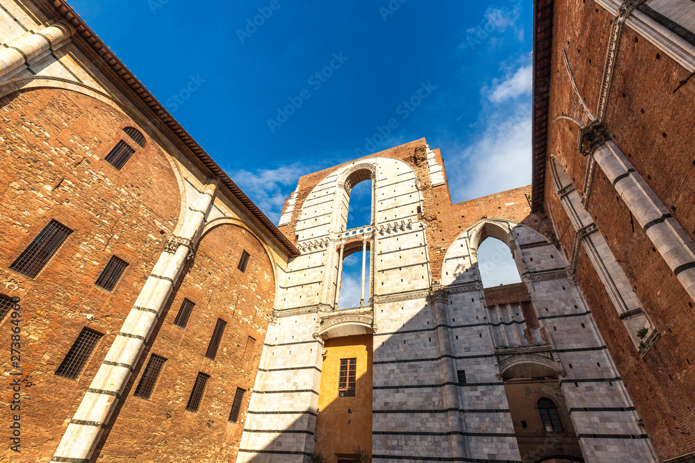 Old houses of Siena town, an ancient city in the Tuscany region of Italy, Europe.