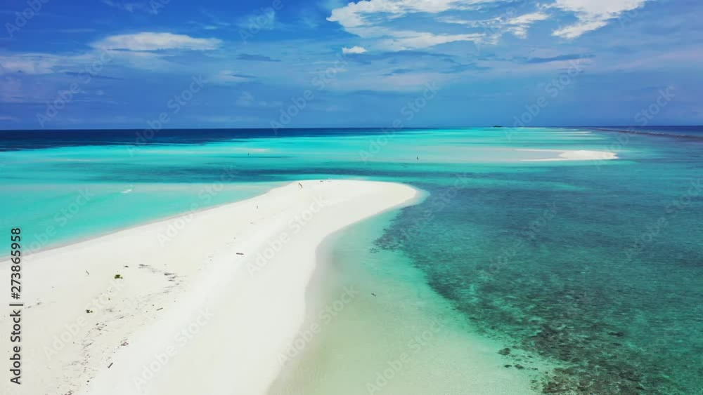 White Sandbar Of Mansalangan In Balabac, with coral reefs and crystal clear water Aerial drone parallax shot White Sandbar Of Mansalangan In Balabac, with coral reefs and crystal clear water Aerial drone parallax shot
