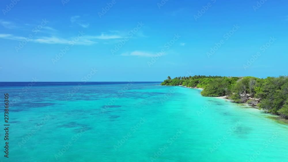 virgin nature of Thailand, crystal clear water of Gulf Of Siam,deserted uninhabited island with Arecaceae forest and white sand beaches aerial dolly in shot virgin nature of Thailand, crystal clear water of Gulf Of Siam,deserted uninhabited island with Arecaceae forest and white sand beaches aerial dolly in shot