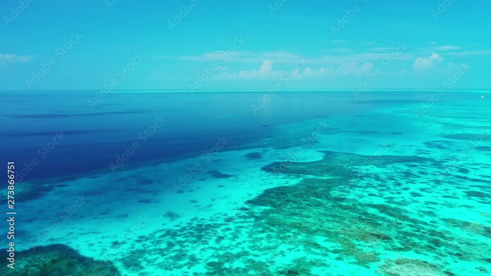 aerial drone shot over crystal clear turquoise Thailand sea with corals pedestal up shot aerial drone shot over crystal clear turquoise Thailand sea with corals pedestal up shot
