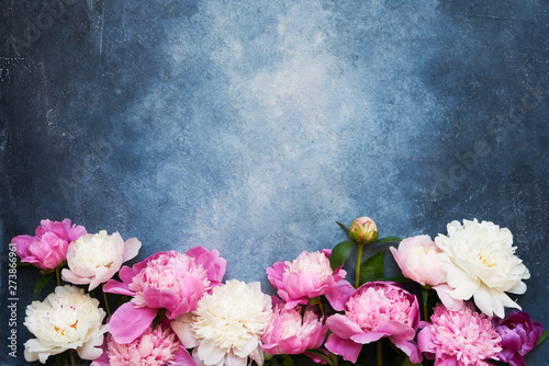 Bakground with white and pink peonies. Flat lay for invitations, congratulations. Greeting card. Copy space, top view