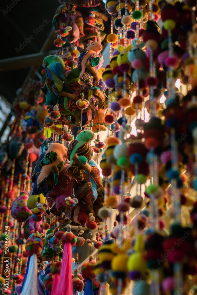 Stuffed animals produced by hand. The string and the pendulum yarn of various colors. Be hung for decoration. Placed inside the Chatuchak weekend market. Bangkok, Thailand.