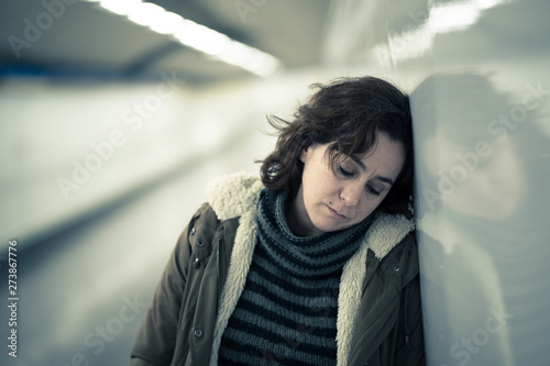 Φωτογραφία Unhappy young woman feeling sad and stressed suffering from depr