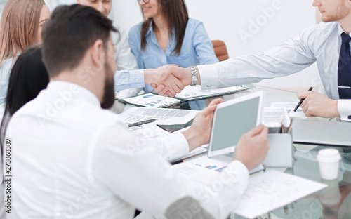 handshake of business people at a working meeting.