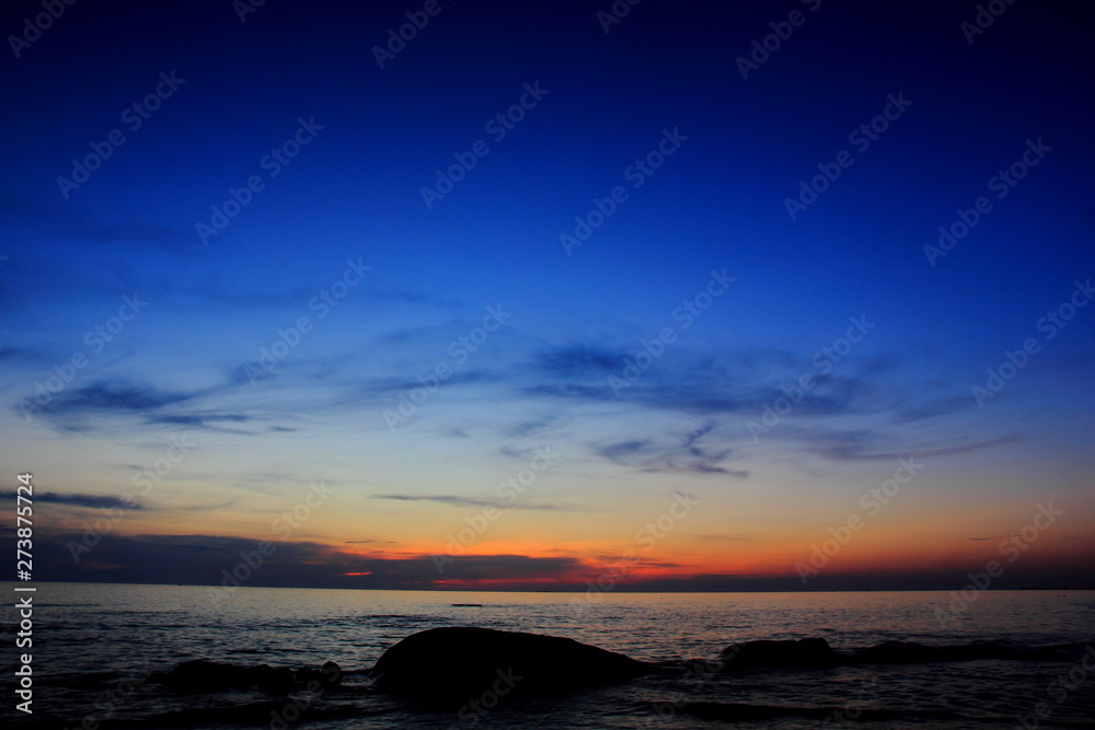Beautiful sunset on the beach,Sea on the twilight sky,for background.