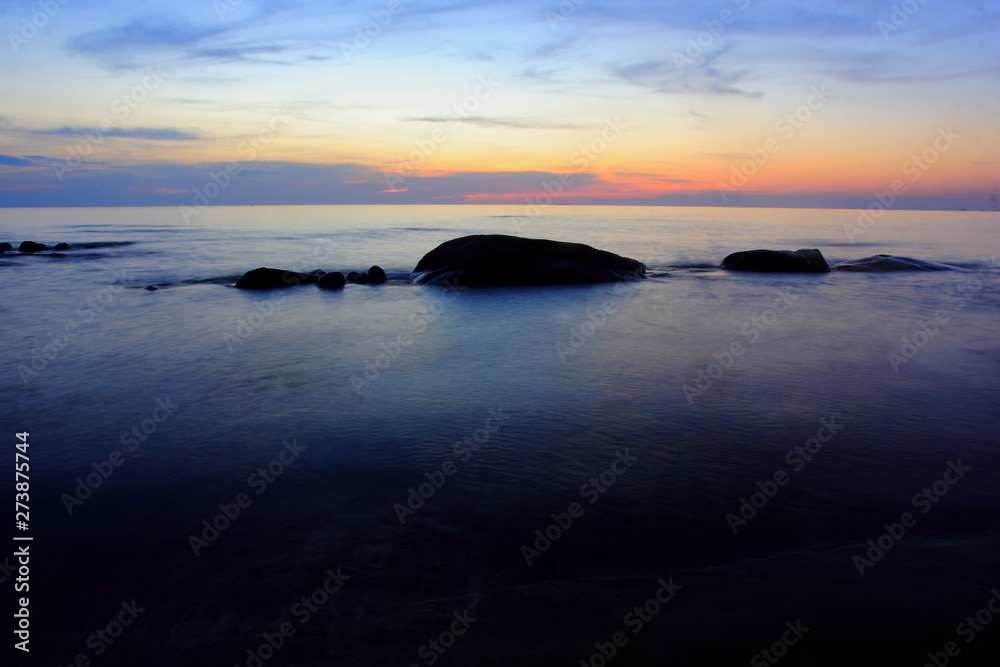 Fototapeta premium Beautiful sunset on the beach,Sea on the twilight sky,for background.