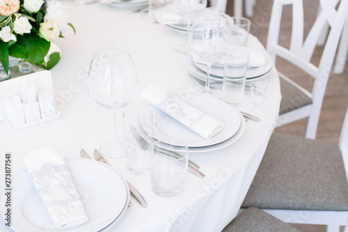 Wedding banquet. Table set for wedding reception © Nastya Tepikina