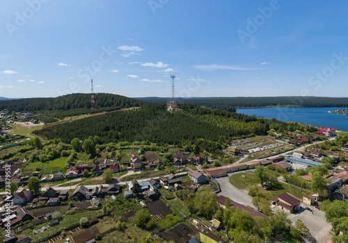 Sysert city. Bessonova mountain and pond. Aerial. Summer day