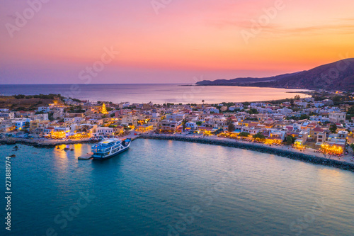 High night view of traditional village of Paleochora at sunset, Chania, Crete, Greece.