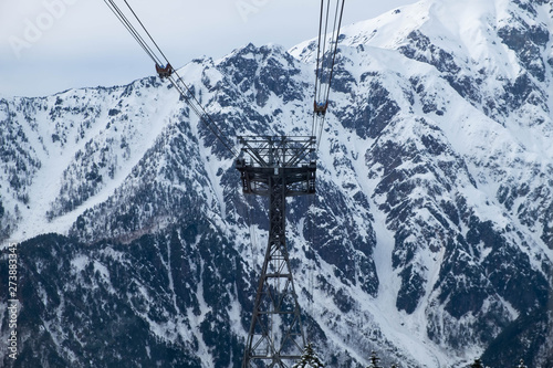 Japan - 18 March 2018 : Shinhotaka Ropeway (Shin-Hotaka), Cable car station during snowing on winter in Takayama, Gifu, Japan photo