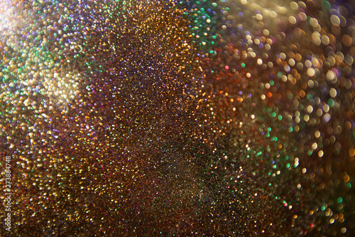 Glitter wonderful lights background. Glitter vintage lights background.Abstract dark.