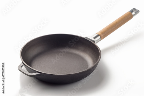 Frying iron pan isolated on white background