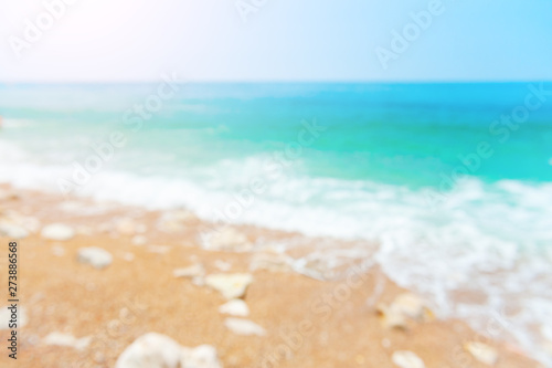 Blurred sea background. Beautiful beach with turquoise water. Travel and vacation concept