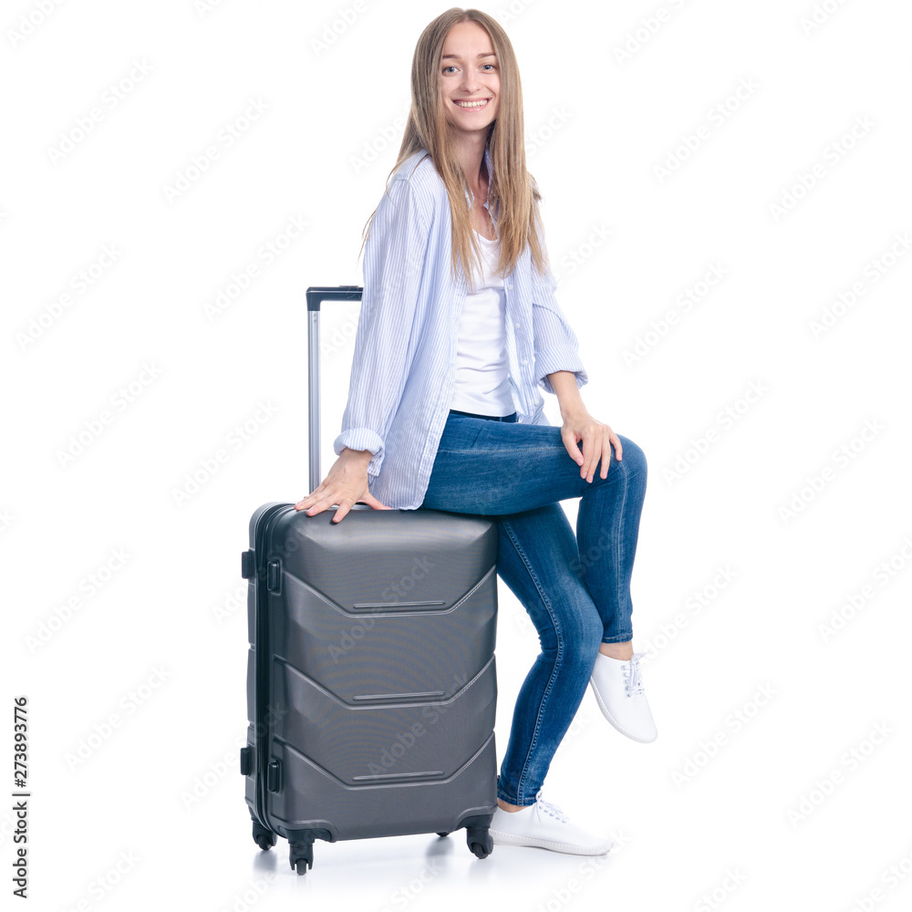 Woman with travel suitcase standing smiling on white background isolation Woman with travel suitcase standing smiling on white background isolation