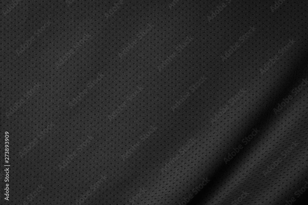 Black jersey texture background. Detail of luxury fabric surface.