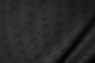 Black jersey texture background. Detail of luxury fabric surface.